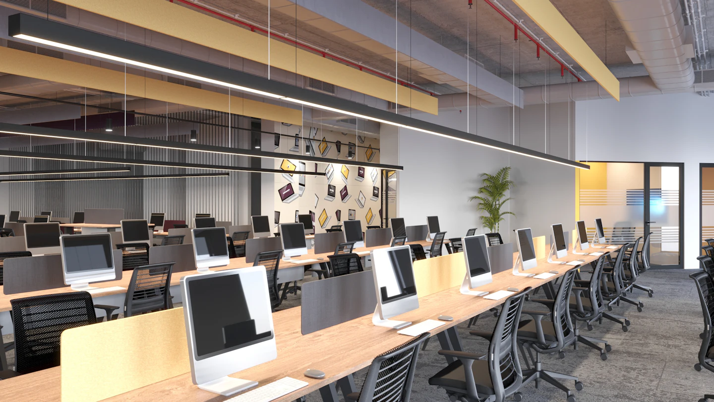 Unoccupied office with desks and computer monitors